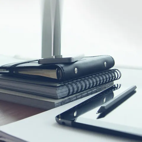 Office workplace with laptop and  smart phone on wood table